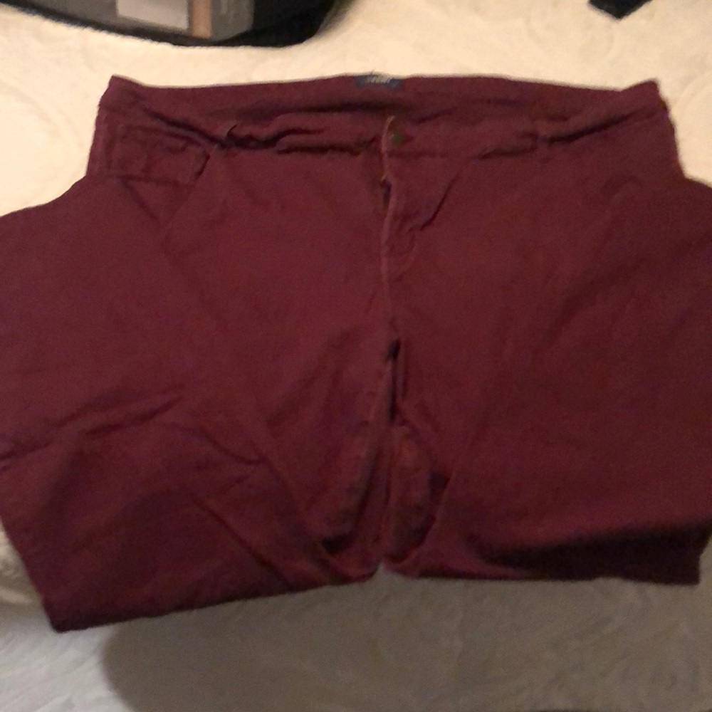 Maroon stretchy jeggings.